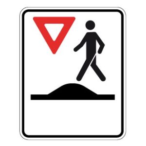 Passage pour piétons sur un dos d'âne allongé ou un carrefour surélevé